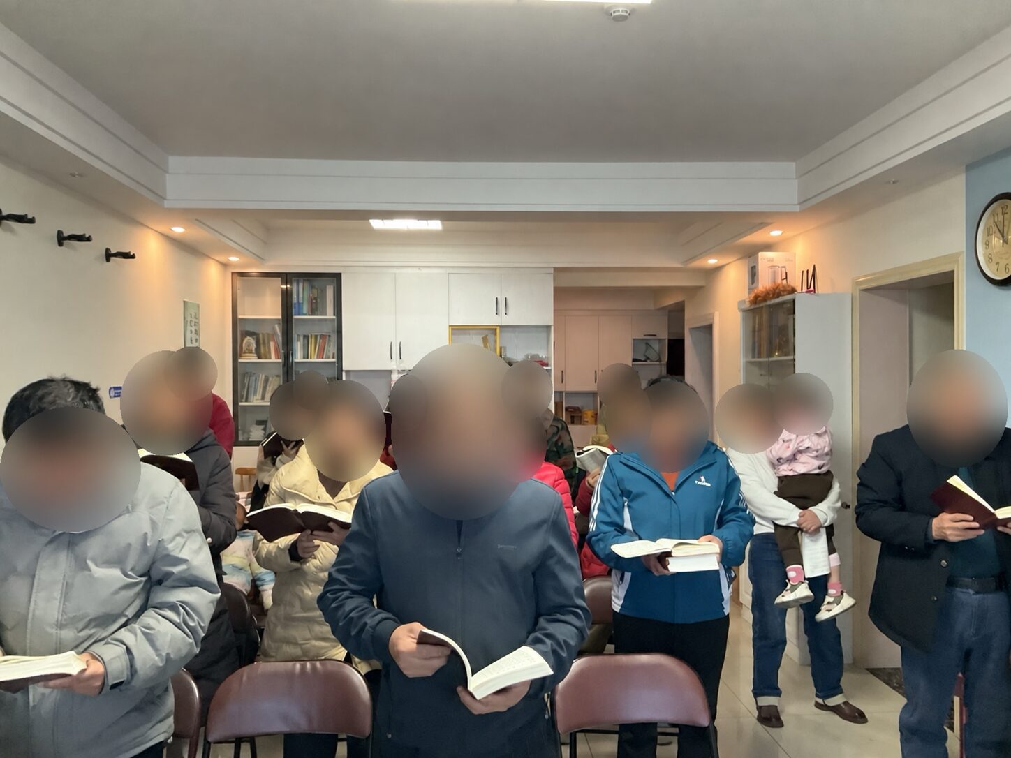 Partners reading together, with all faces blurred for privacy
